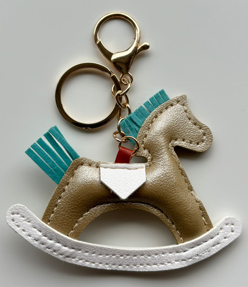 Charm cavallino laminato